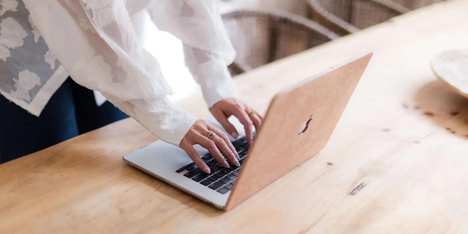 A laptop showing a warm, editorial website design