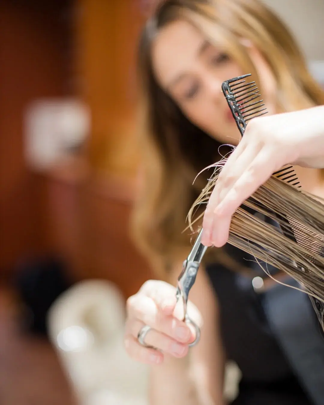 A Marro's stylist cutting a client's hair